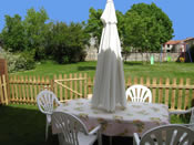 Chasselas Child friendly outdoor dining area  is opposite the playground (click to enlarge photo)