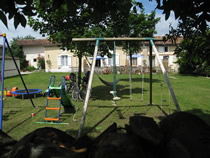 Safe, fully enclosed communal lawn and kids playground